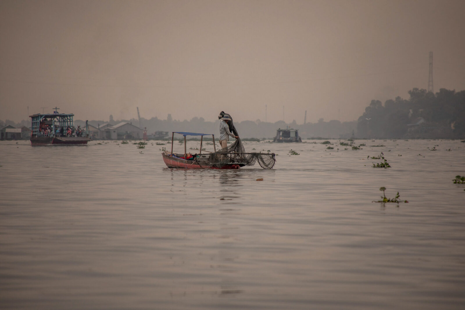 fischer auf dem mekong